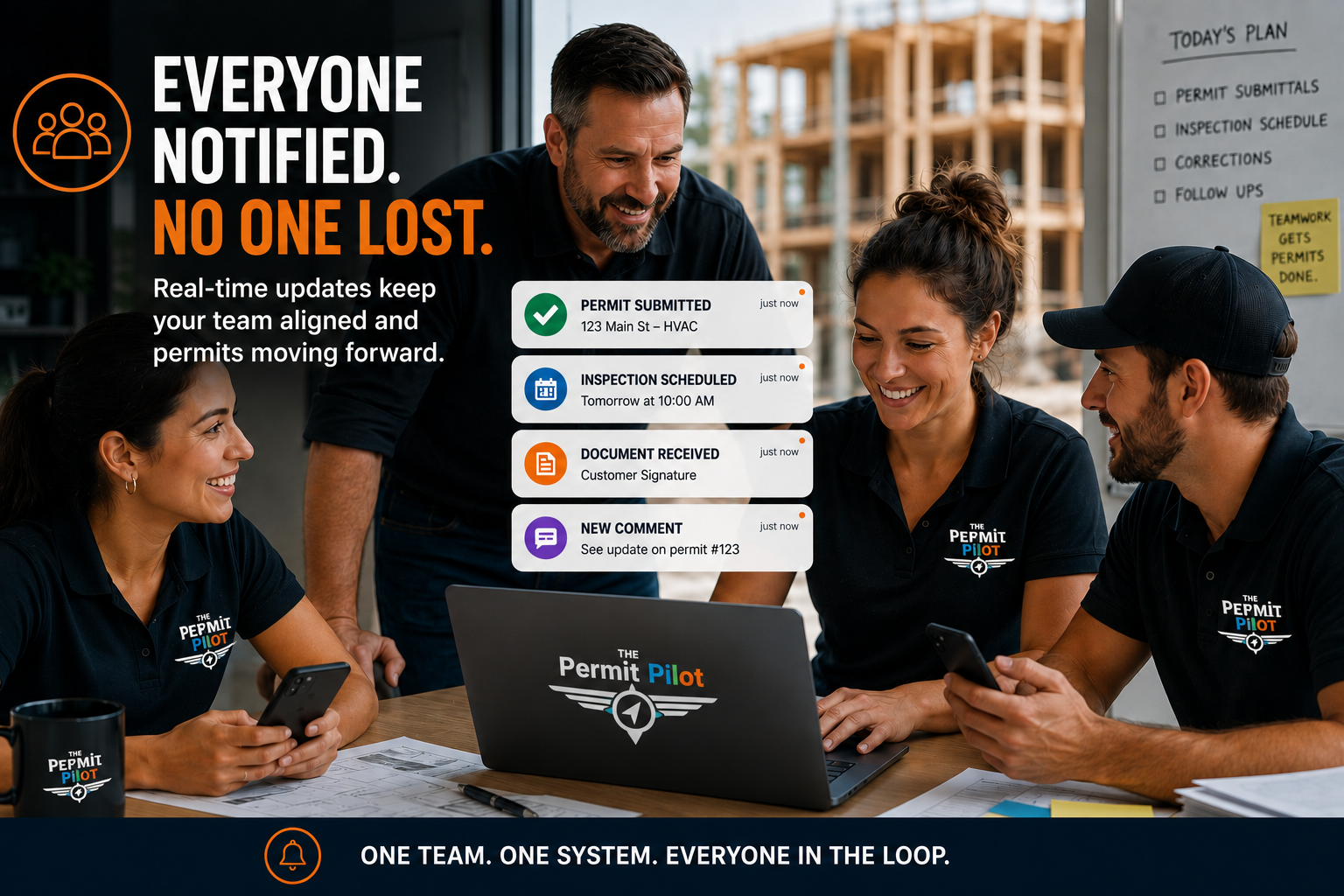 Office team reviewing live permit status updates together on a laptop